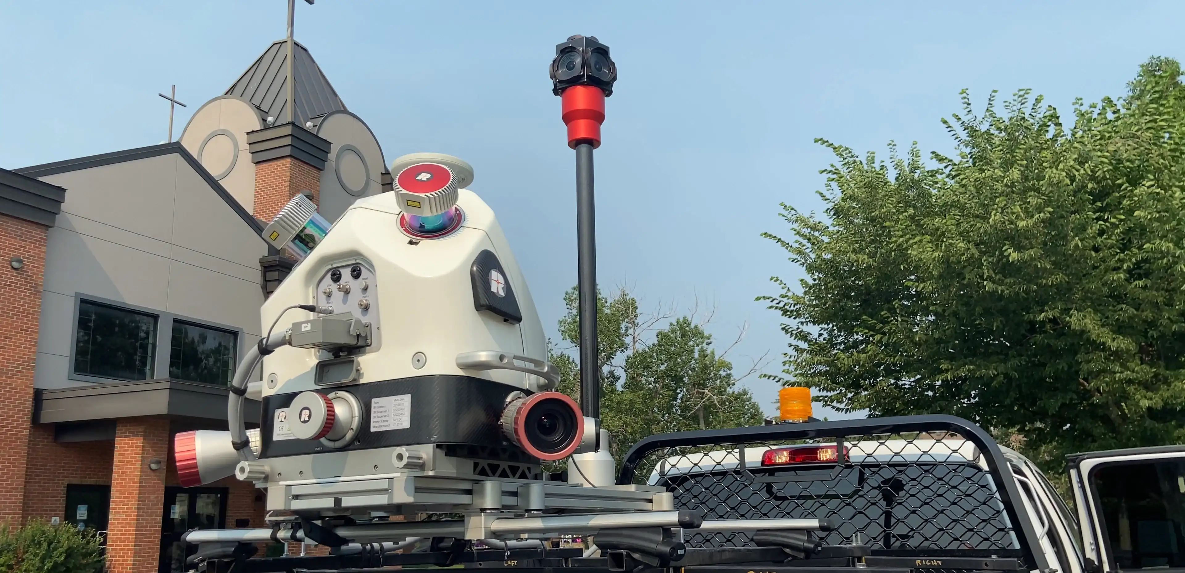 Mobile LiDAR scanner mounted on a TULLOCH mapping vehicle.