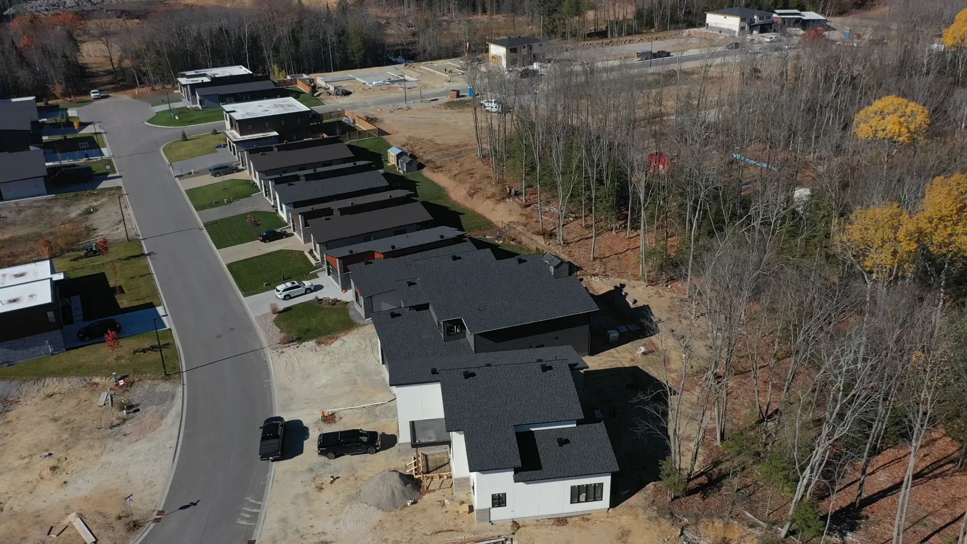 Aerial view of a residential development and surrounding neighbourhood.