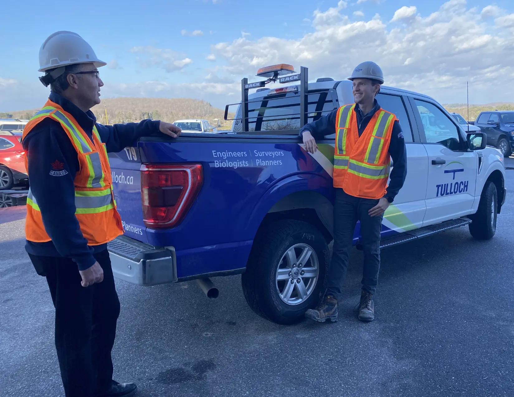 Chatting by the TULLOCH truck.