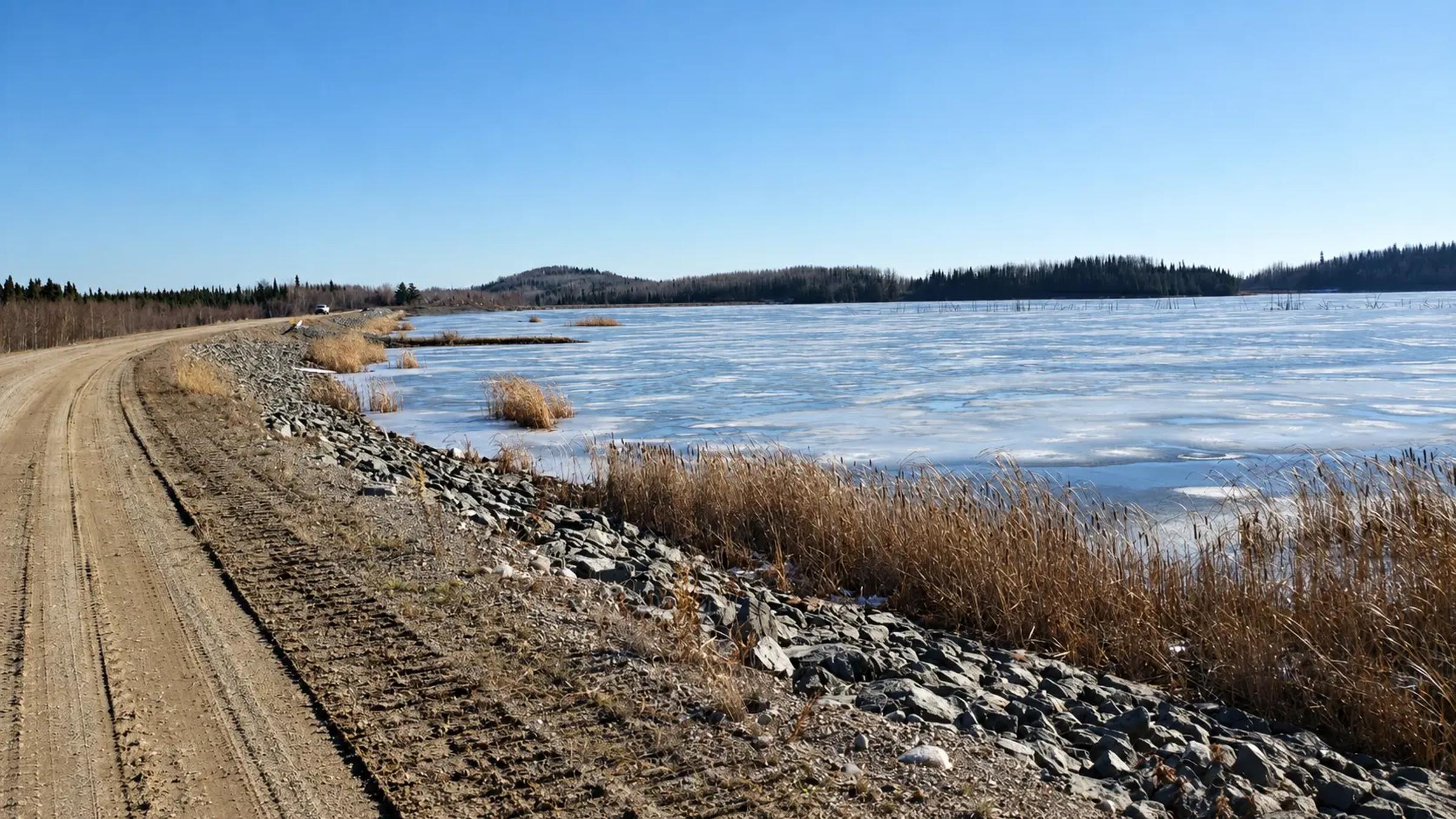 Riprap embankment and shoreline at Shebandowan Mine during a dam safety review.