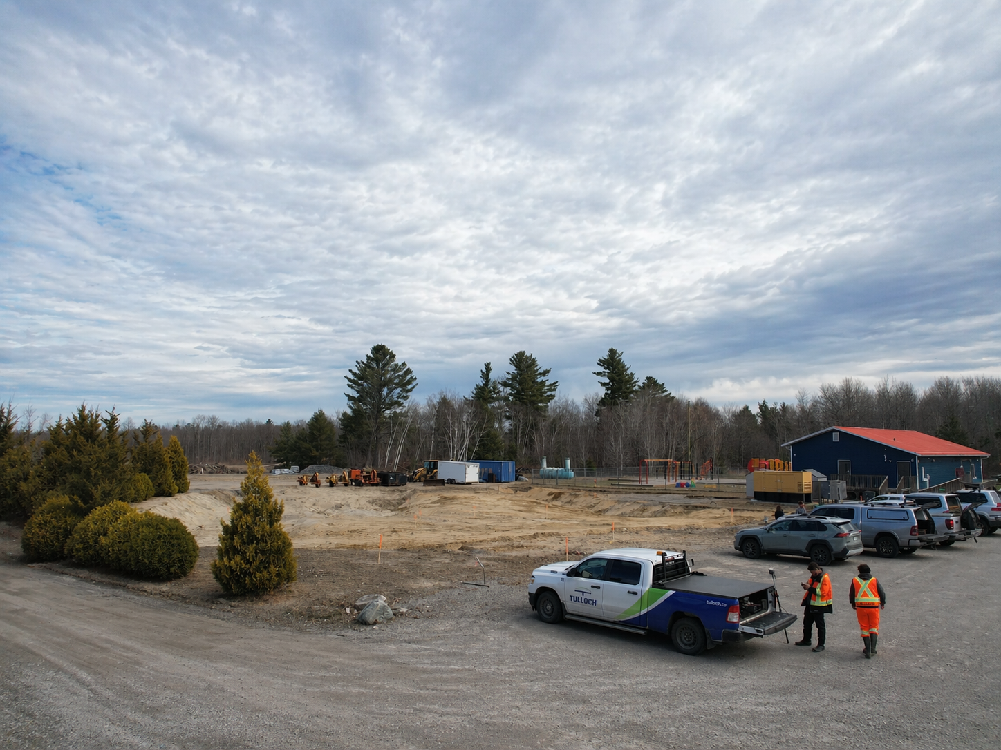 TULLOCH field crew and vehicles working at the Henvey Inlet Health Centre project.