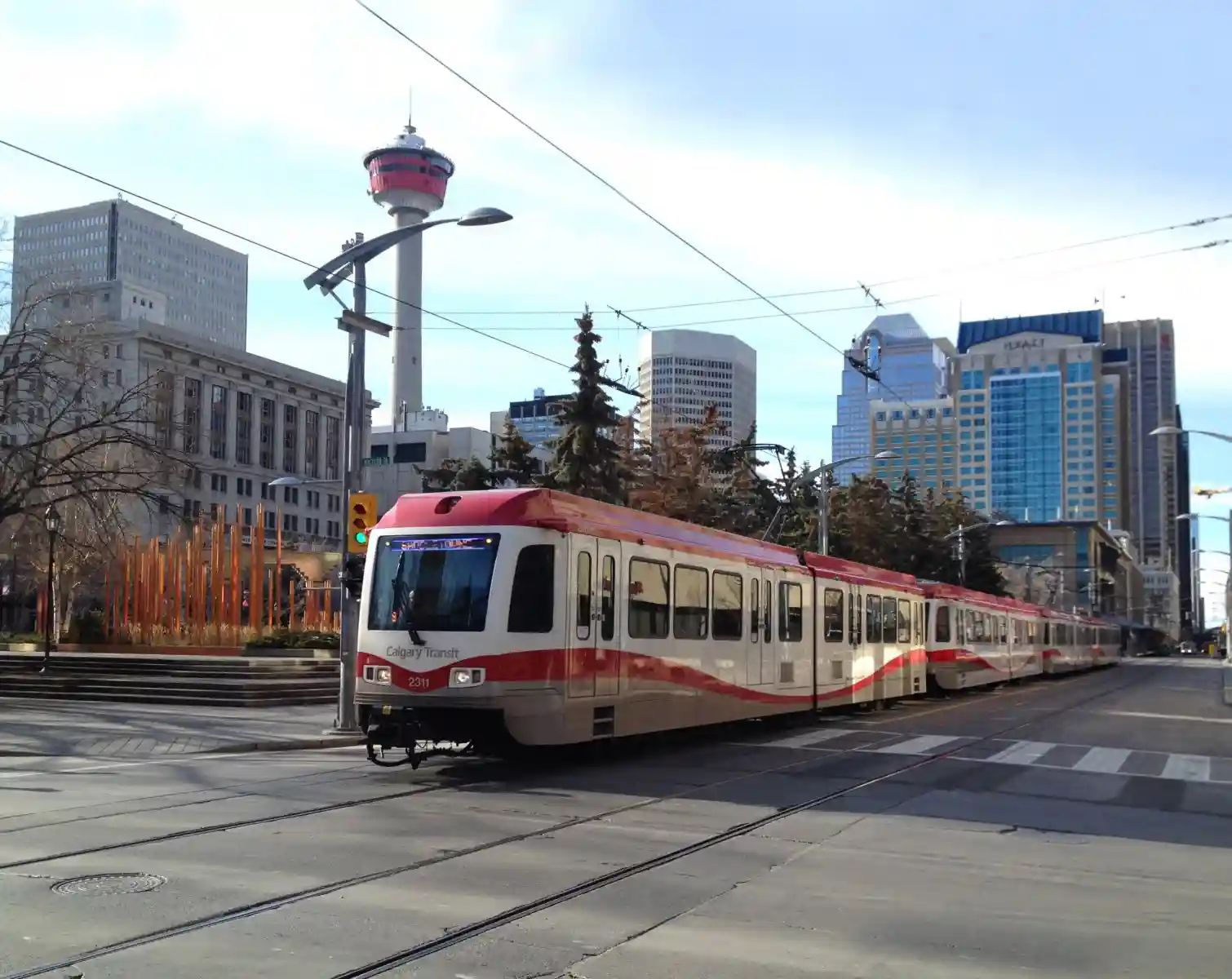 Calgary light rail transit vehicle travelling through the city.