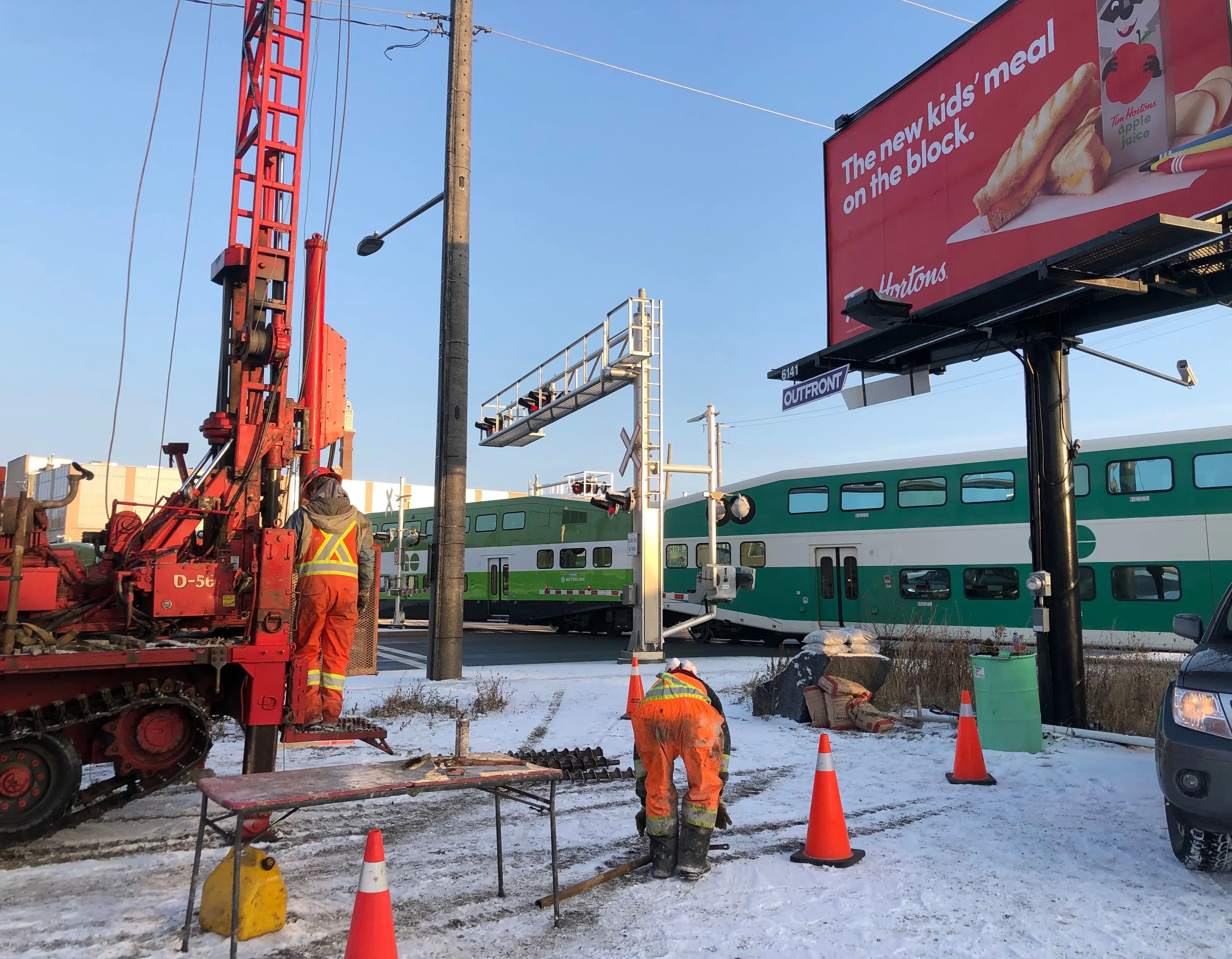 Geotechnical drilling and field work beside a Metrolinx rail corridor in Newmarket.
