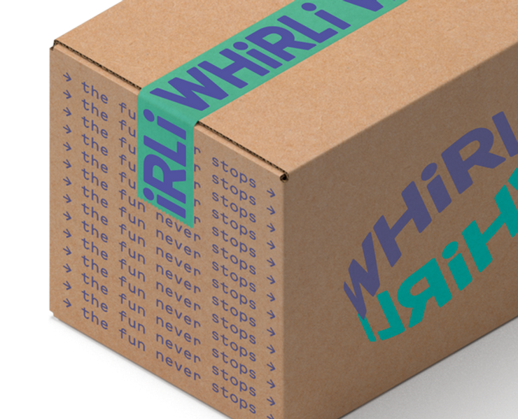 Brown shipping box with Whirli logo and branding printed on two sides. The box is sealed with tape printed with the Whirli logo.