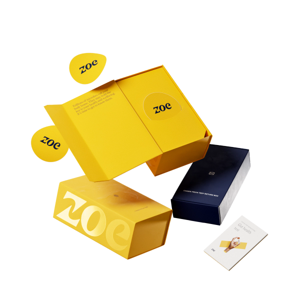 3D render of a yellow custom clamshell rigid box surrounded by branded stickers.