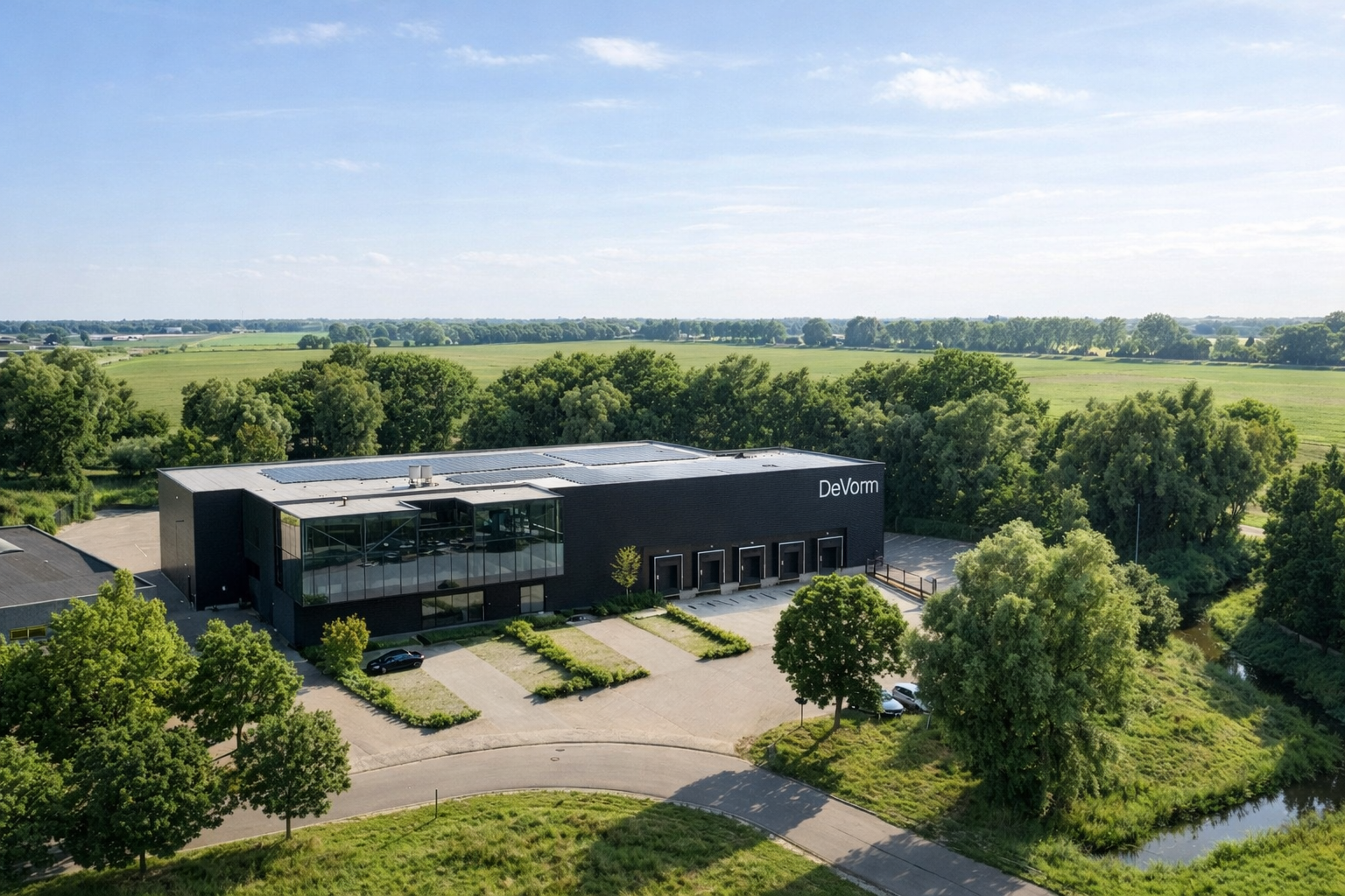 De Vorm headquarters in Duiven, the Netherlands, aerial view with solar panels on the roof