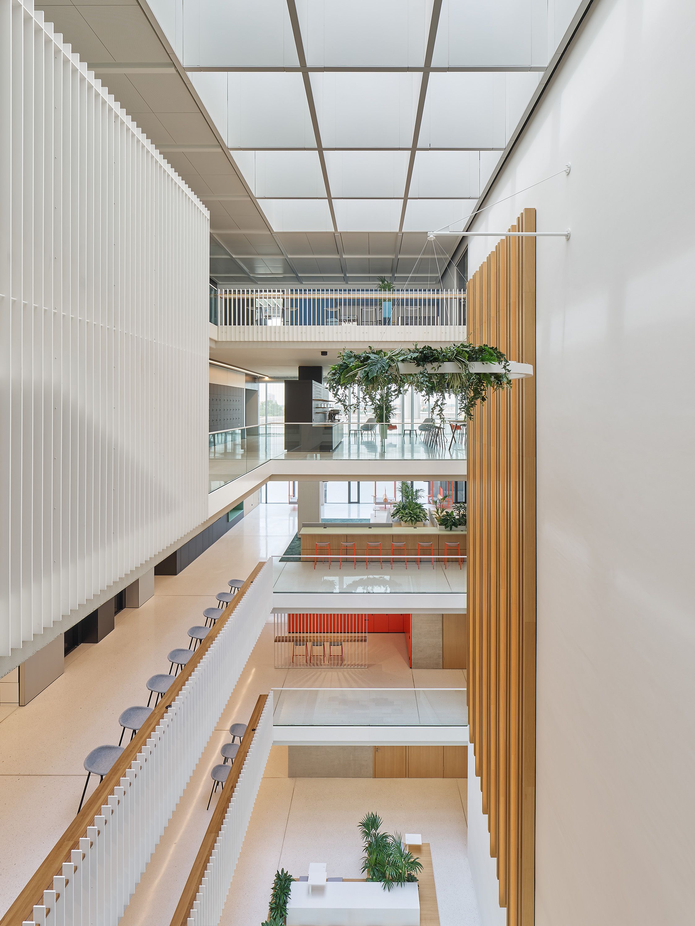 LJ 3 PET Felt Bar Stools in custom colours along atrium balconies at Siemens Healthineers, Erlangen