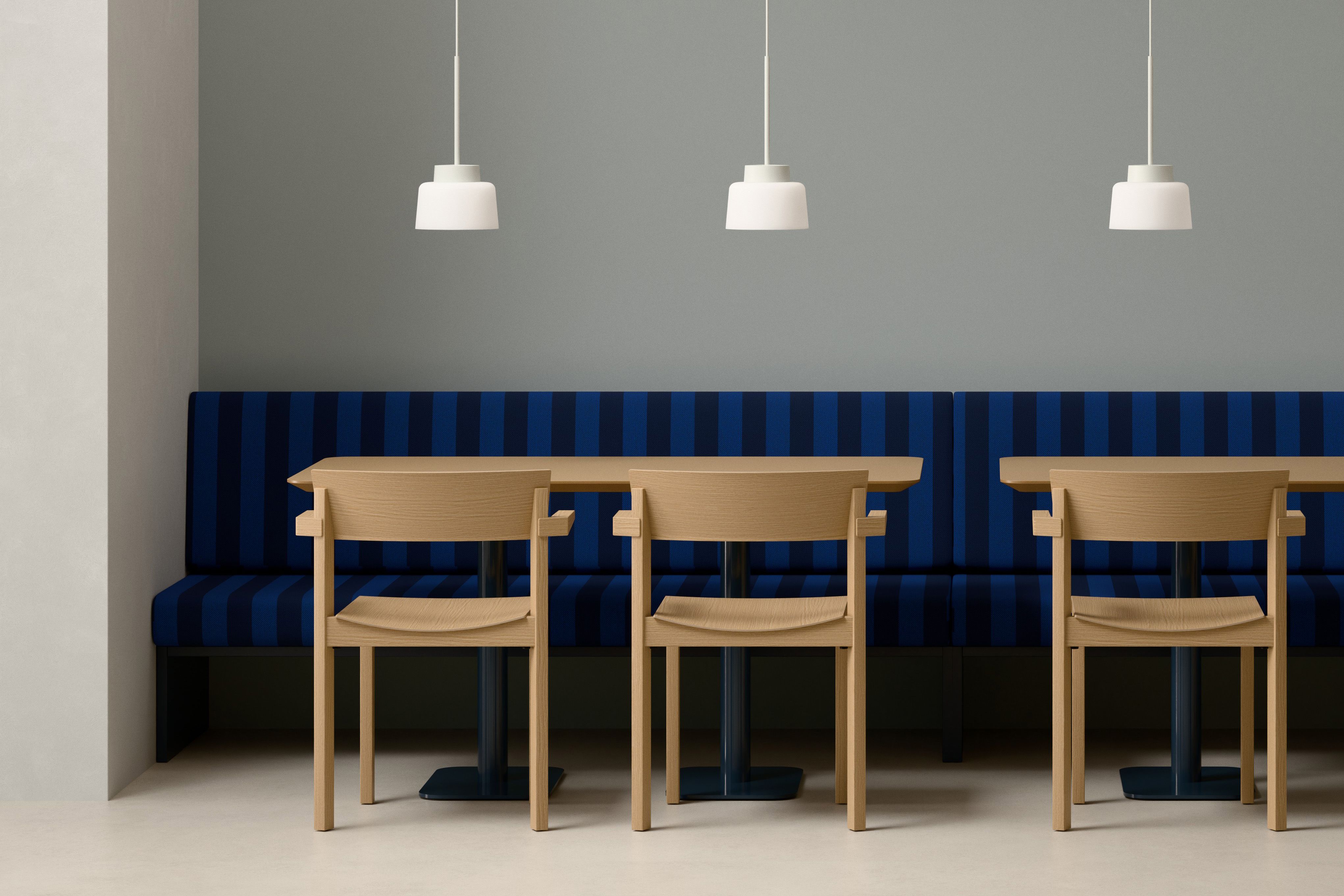 Split Straight Drum Pendant Lamps above a bench seat in a hospitality setting