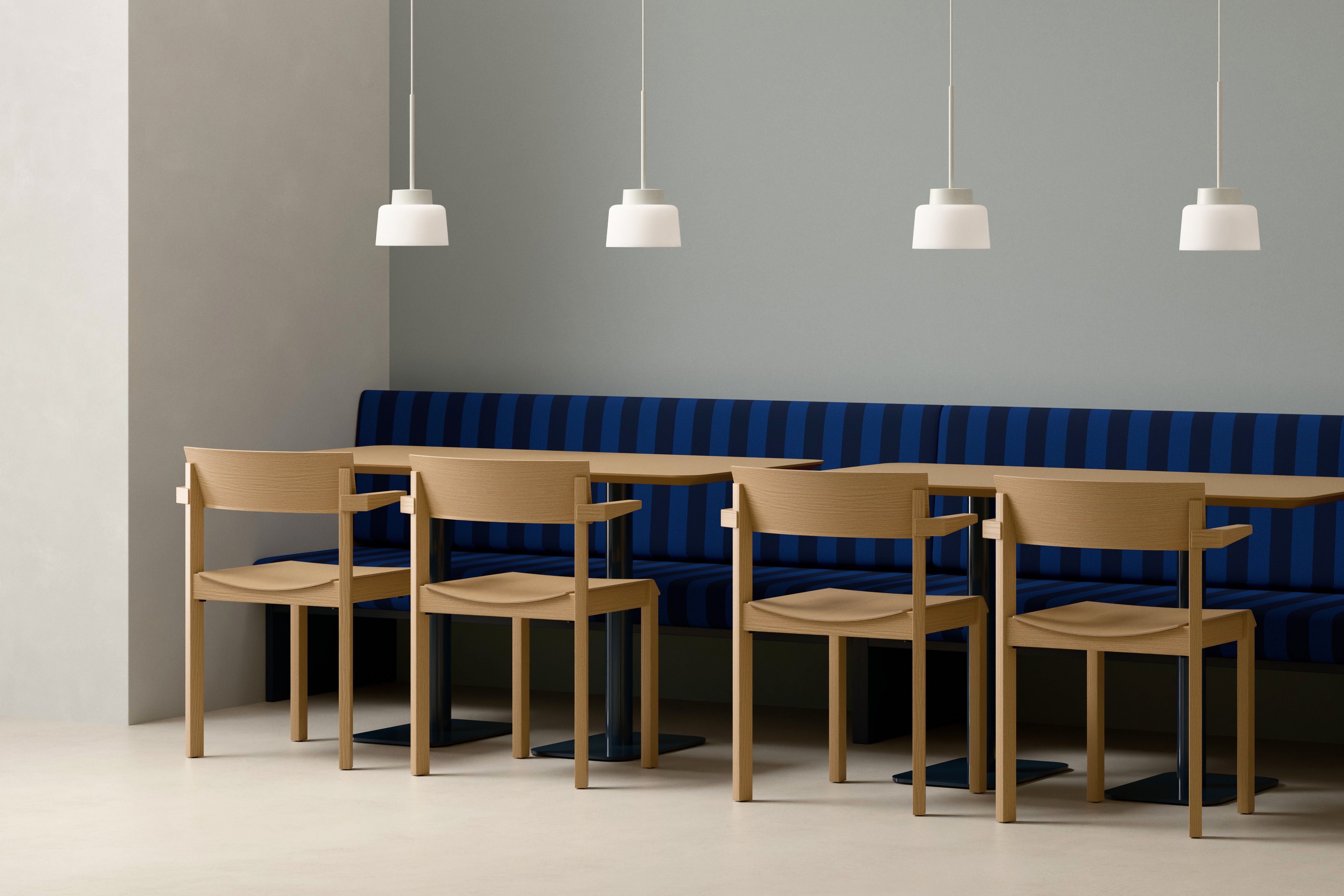Split Straight Drum Pendant Lamps above a bench seat in a hospitality setting