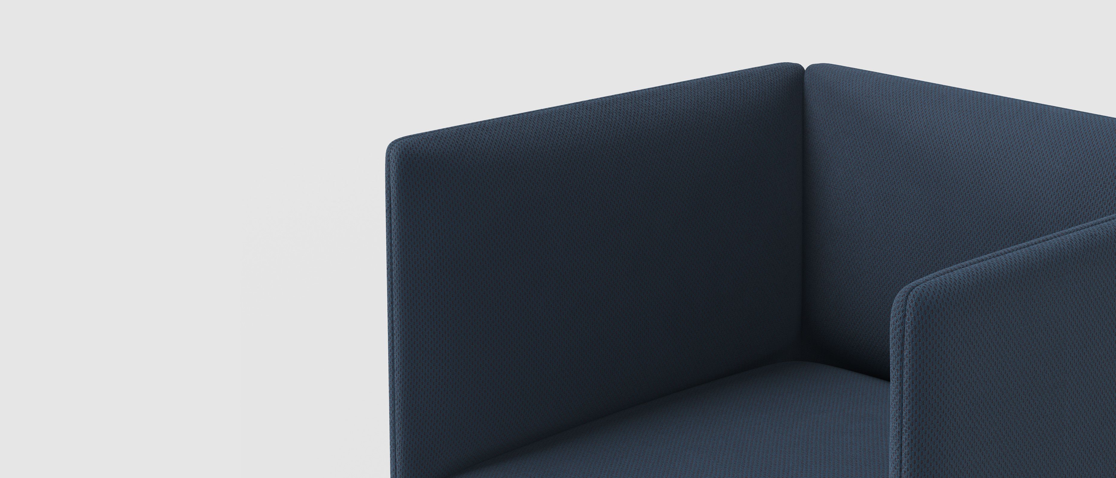 Mino one-seat sofa in dark blue Kvadrat fabric, close-up detail of backrest and armrest