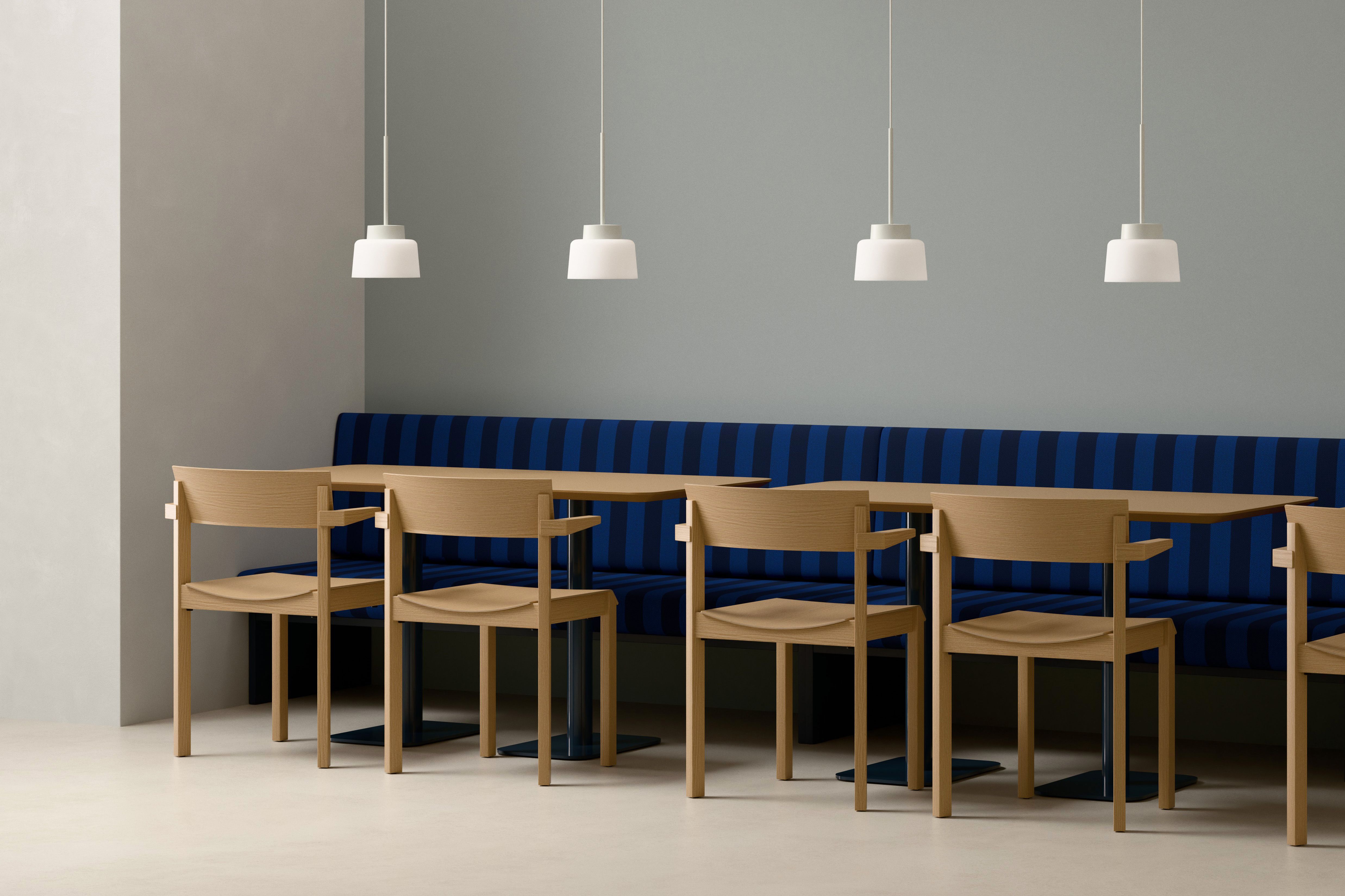 Split Straight Drum Pendant Lamps above a bench seat in a hospitality setting