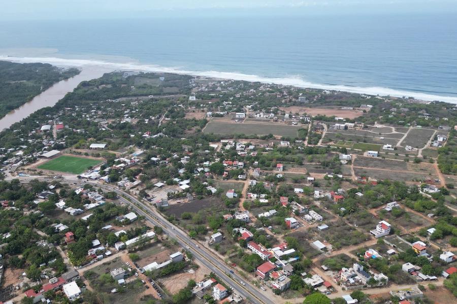 Aerial view of La Barra de Colotepec, the river mouth and the beach