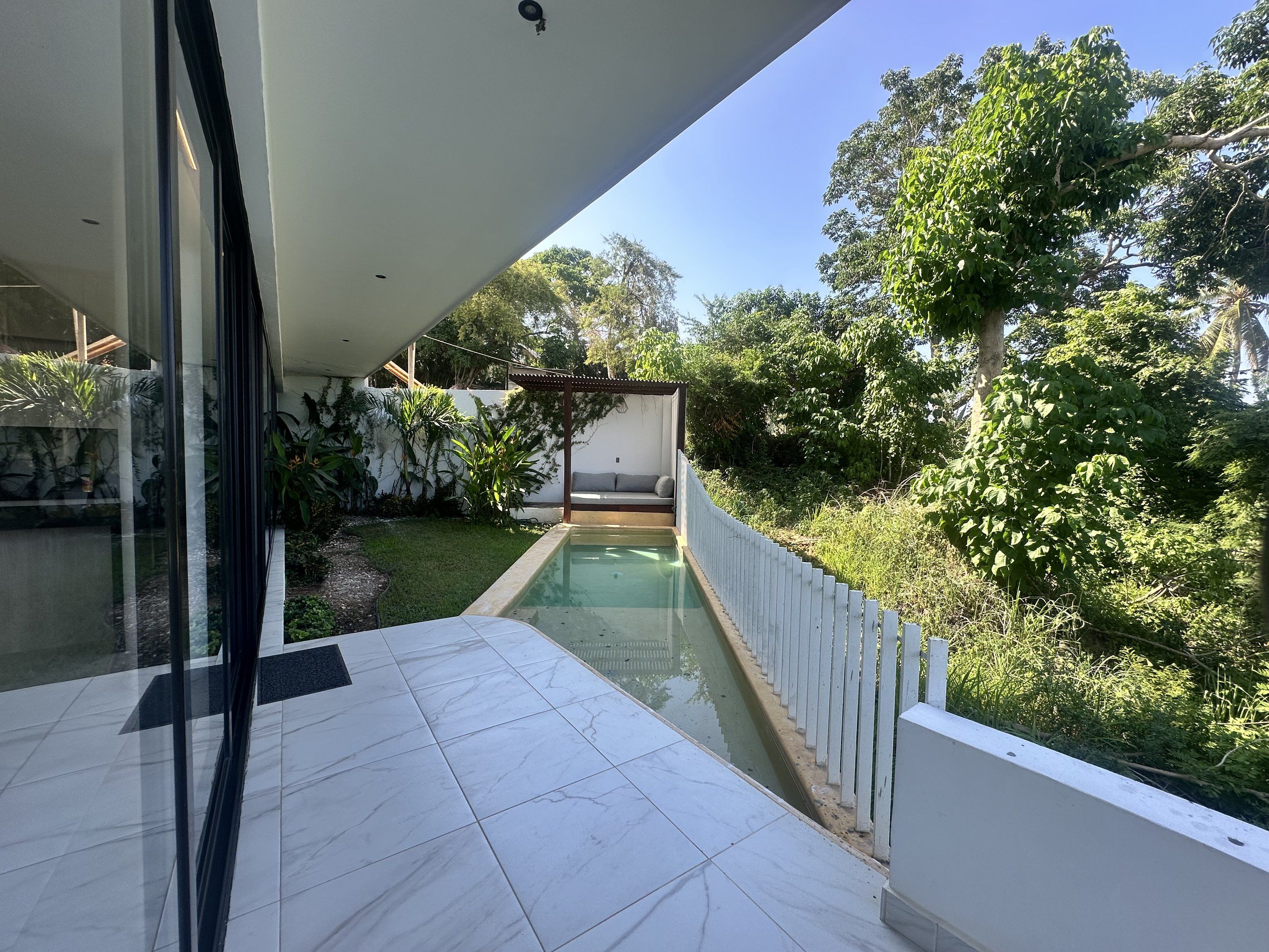 Ground-floor terrace with private lap pool and garden, ZUL Residences