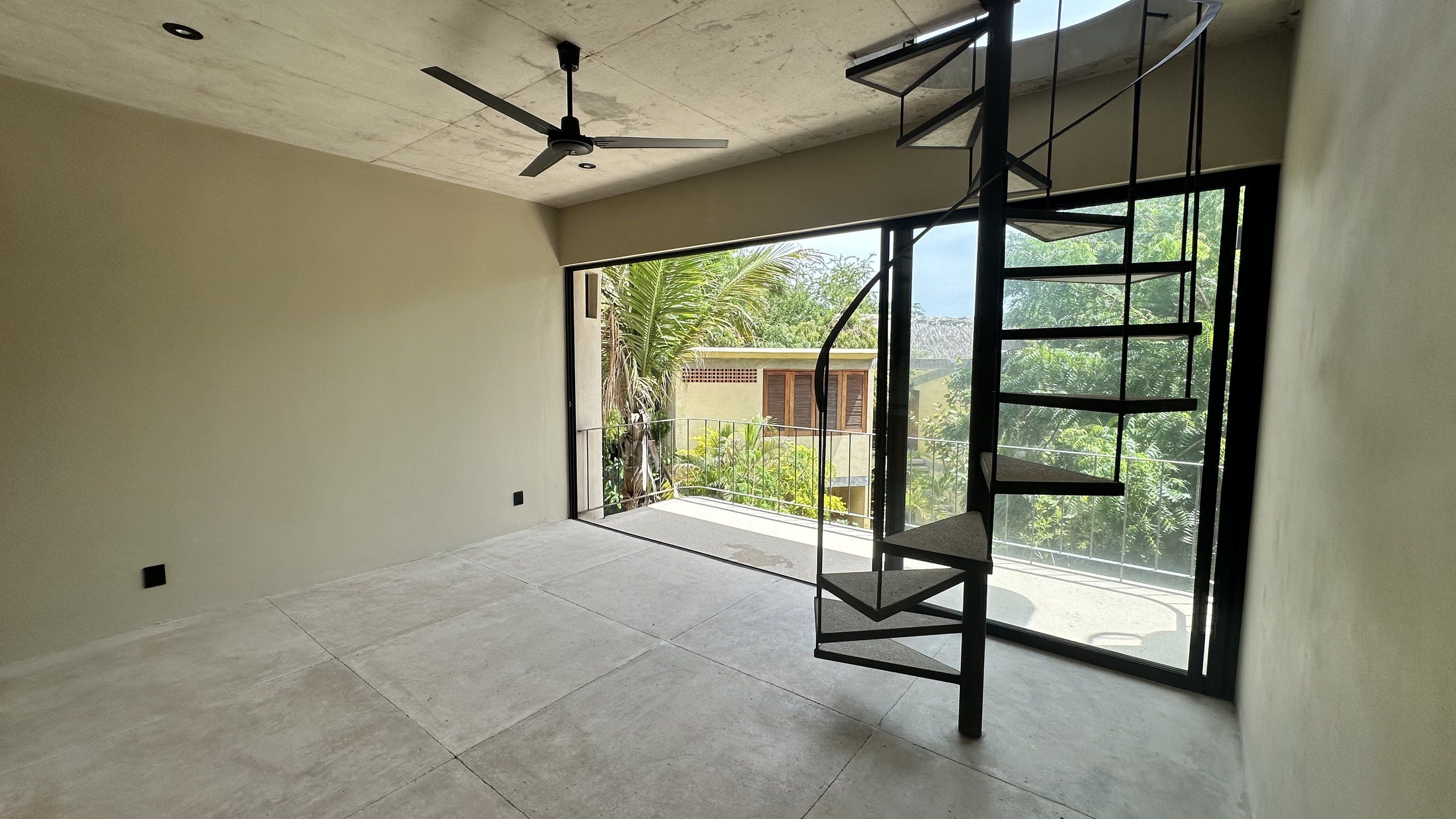 Studio living space with glass doors