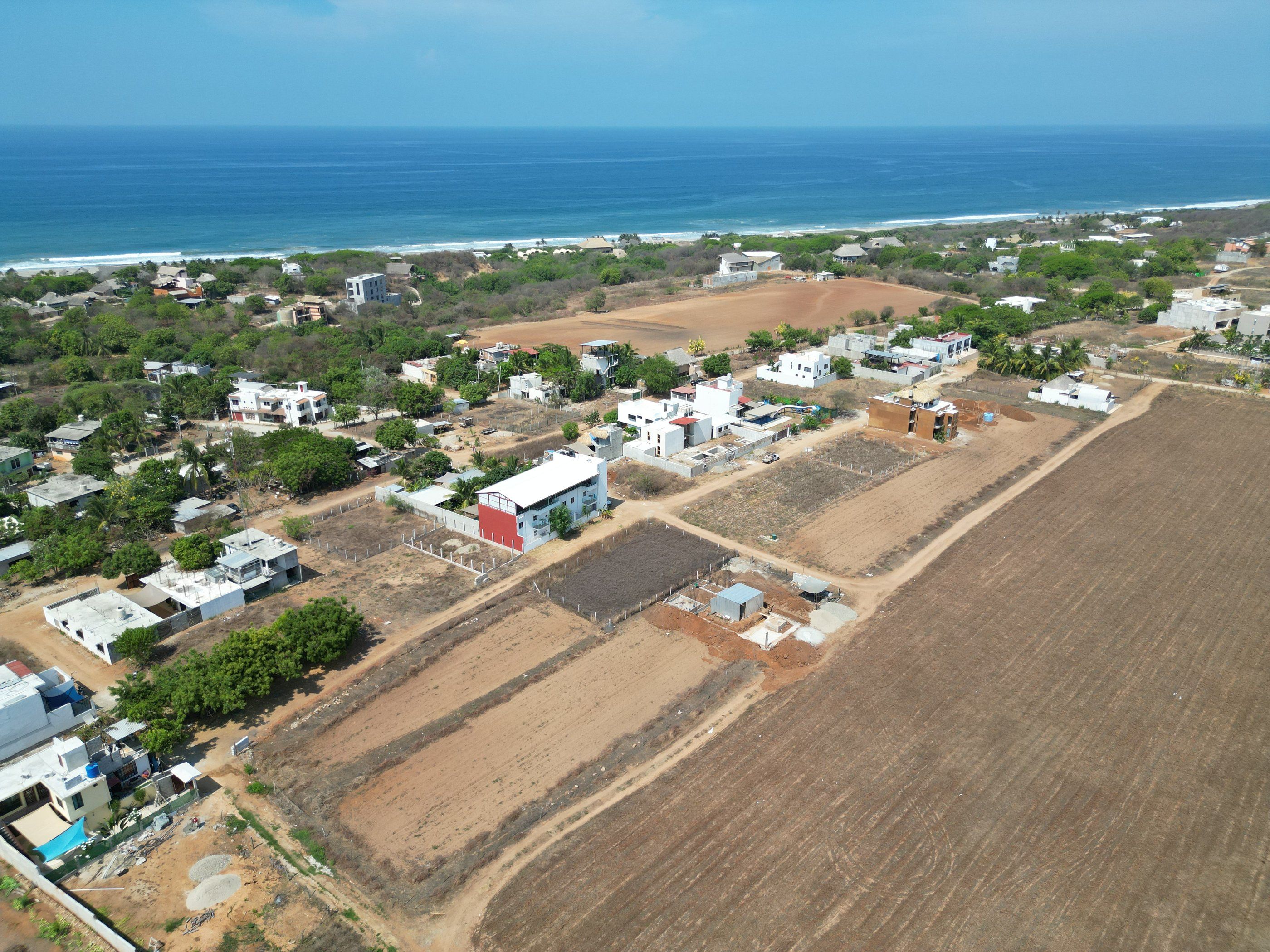 Aerial view of the lots with the ocean beyond, Barra de Colotepec