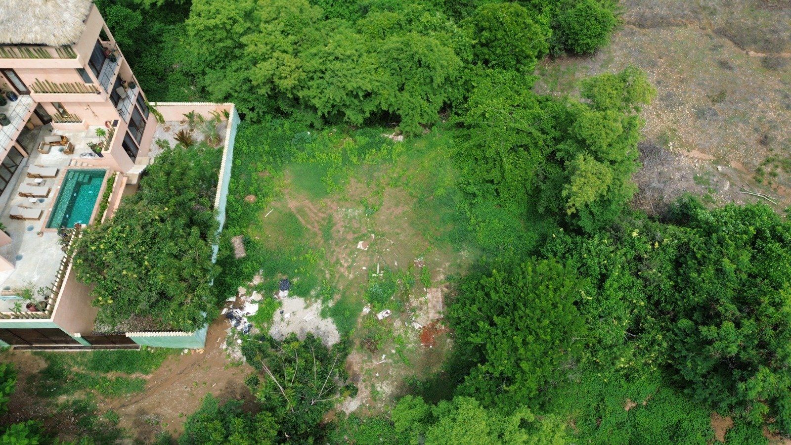 Vista cenital de los lotes junto a una villa vecina, Barra de Colotepec
