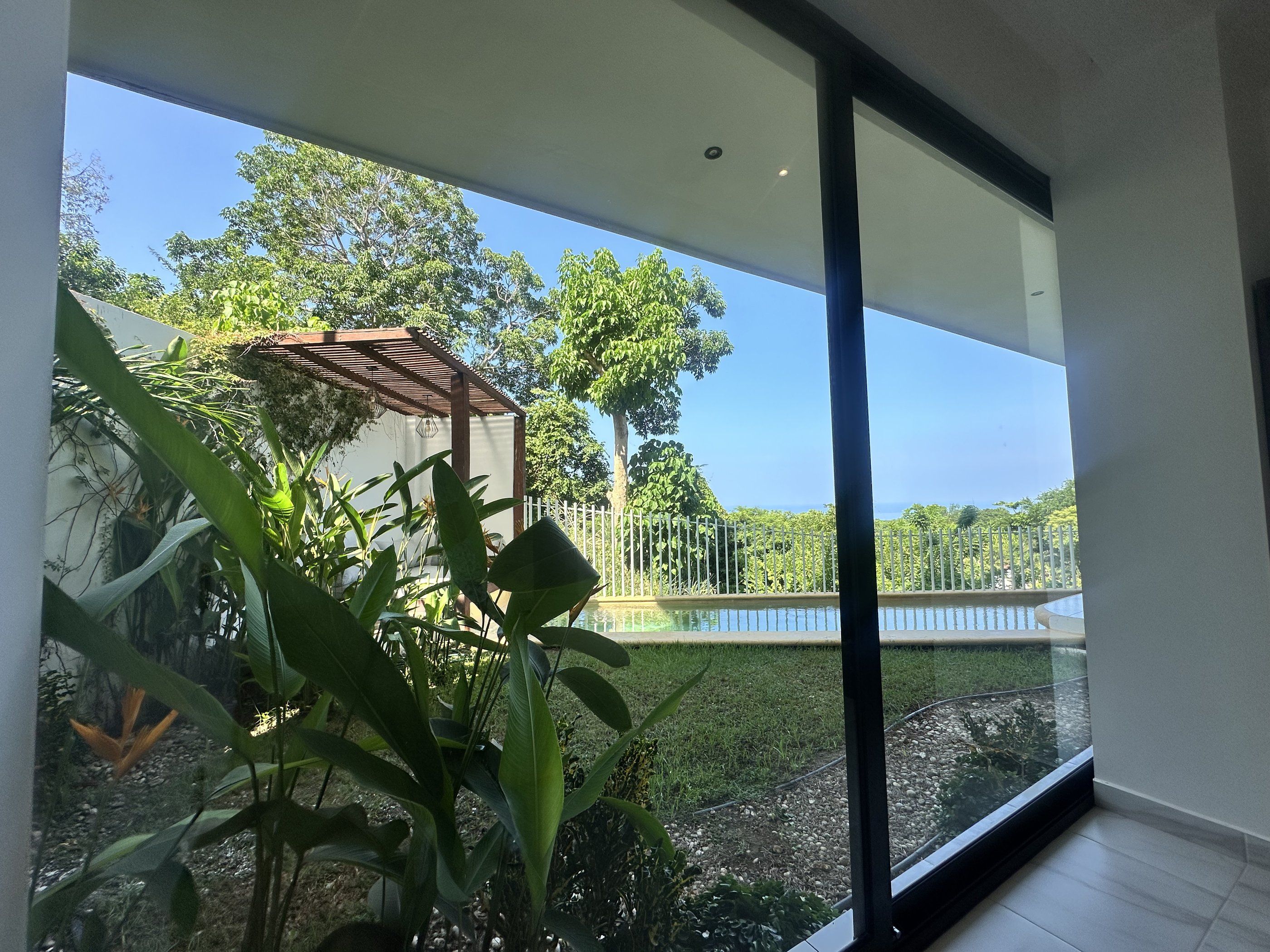 Floor-to-ceiling glazing onto the garden, ZUL Residences, Emiliano Zapata