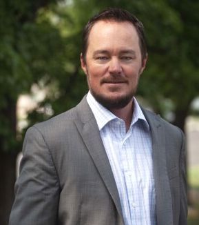 Portrait of C.J. Rhyne, President and CEO of Active Insurance Solutions