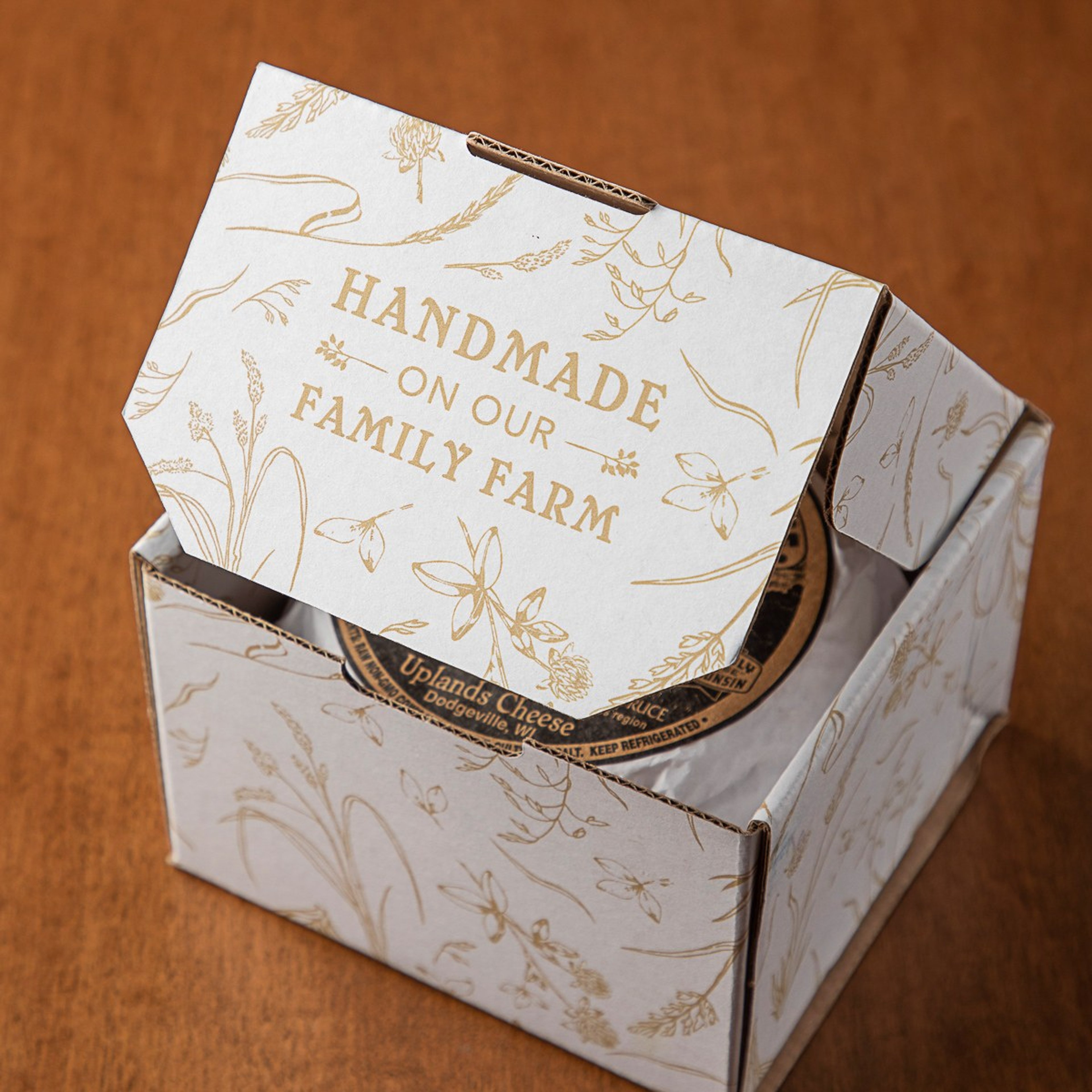 A Rush Creek Reserve gift box printed with “Handmade on our family farm”