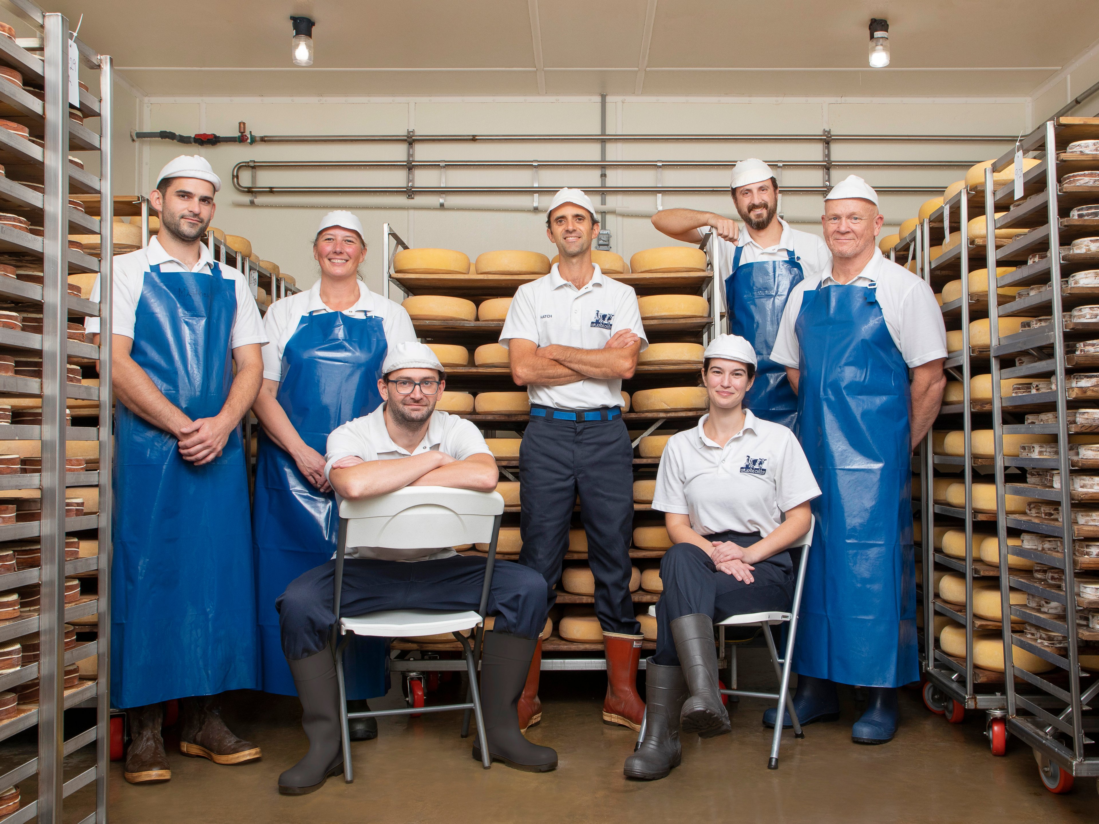 The cheesemaking team in the aging room