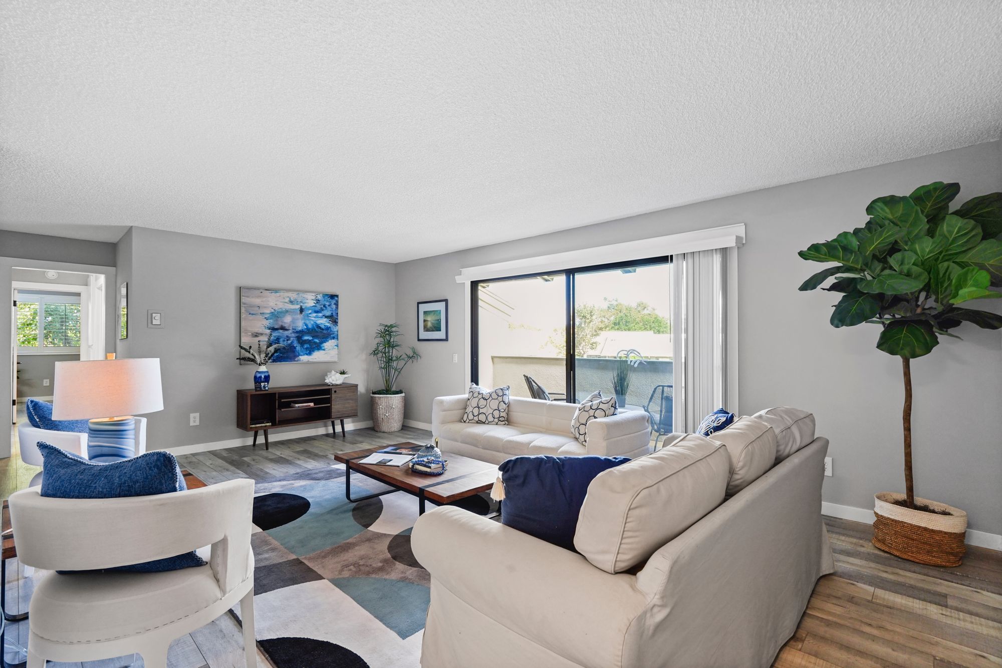 Condo living space with warm tones and decorative accents