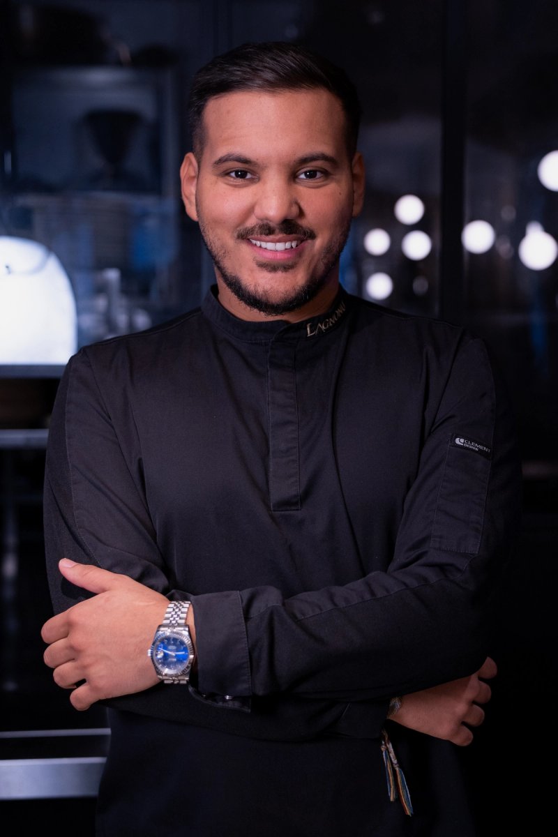 Chef portrait in restaurant kitchen artistic and professional