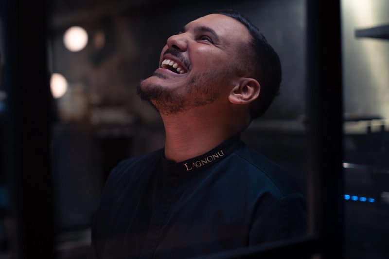 Chef portrait in restaurant kitchen artistic and professional