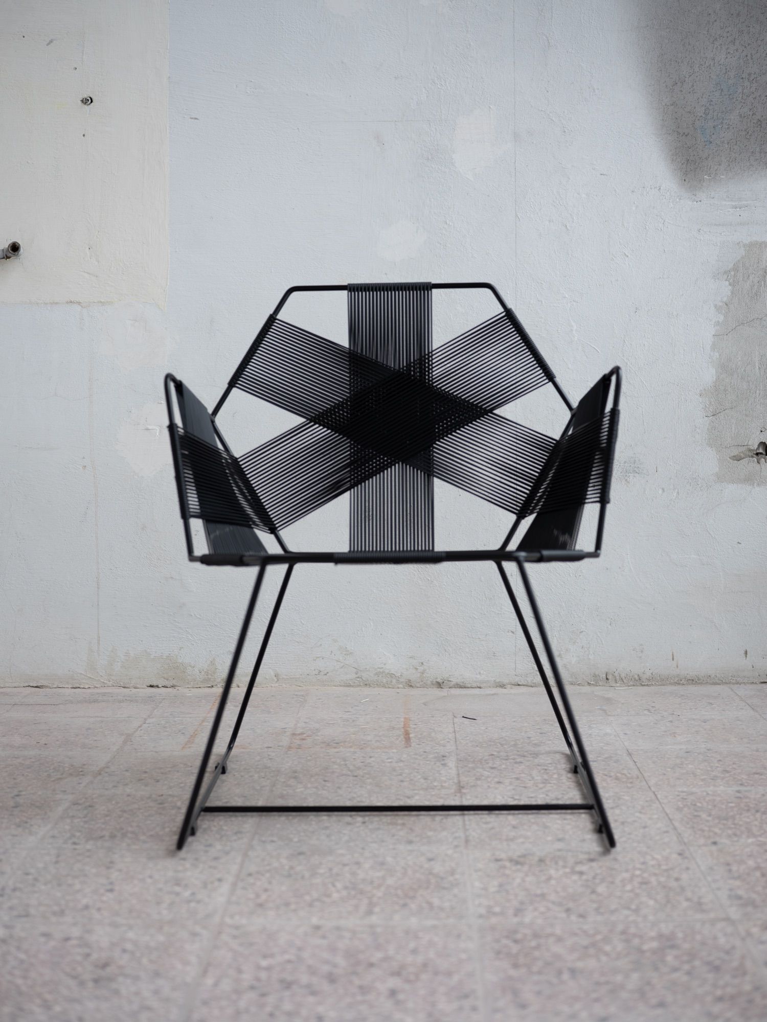The Hexagon seen straight from the front, its weave forming a six-pointed cross.