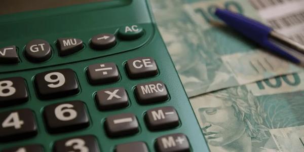 Como parcelar IPTU e IPVA no cartão de crédito com a Quita?