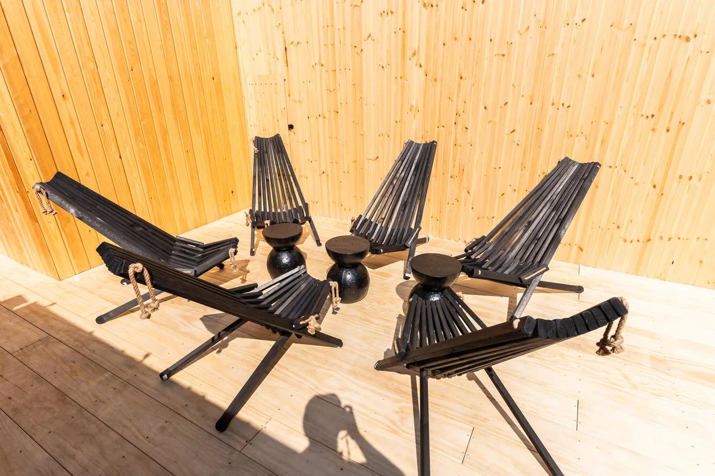 Guests on the upper bench of the sauna