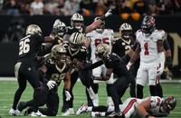The New Orleans Saints react after a sack and fumble recovery by defensive end Chase Young (99) during the second quarter against the Tampa Bay Buccaneers during Sunday's game.