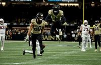 New Orleans Saints cornerback Alontae Taylor (1) celebrates with Pete Werner (20) after a sack against the Arizona Cardinals