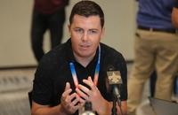 New Orleans Saints head coach Kellen Moore answers a question from a reporter at the NFL football annual meetings, Monday, March 30, 2026, in Phoenix.