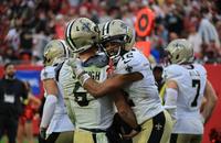 Saints quarterback Tyler Shough and receiver Chris Olave celebrate a touchdown during the fourth quarter at Tampa Bay.