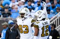 New Orleans Saints players Juwan Johnson (83) and Chris Olave (12) celebrate after a touchdown during the fourth quarter against the Carolina Panthers at Bank of America Stadium.