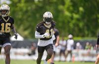 New Orleans Saints running back Alvin Kamara goes through drills during practice at NFL football minicamp in Metairie, La., Tuesday, June 10, 2025.