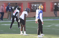 Virginia running back J'Mari Taylor lines up next to LSU quarterback Garrett Nussmeier at the 2026 Senior Bowl.