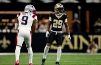 New Orleans Saints cornerback Quincy Riley (29) lines up across from New England Patriots receiver Kayshon Boutte (9).