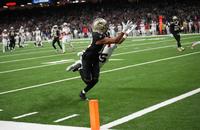 Oct 12, 2025; New Orleans, LouisiaSaints wide receiver Chris Olave (12) misses a touchdown reception under pressure from New England Patriots cornerback Marcus Jones (25) during Sunday's game.