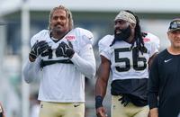 New Orleans Saints defensive end Cameron Jordan (94) and linebacker Demario Davis (56)