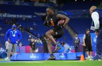 Notre Dame running back Jeremiyah Love (11) runs a drill at the NFL football scouting combine in Indianapolis, Saturday, Feb. 28, 2026.