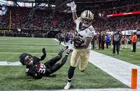 New Orleans Saints wide receiver Ronnie Bell (85) catches a touchdown pass behind Atlanta Falcons cornerback C.J. Henderson (39) during the second half Sunday at Mercedes-Benz Stadium.