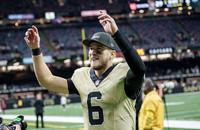 New Orleans Saints quarterback Tyler Shough (6) smiles as he leaves the field after a game against the New York Jets.