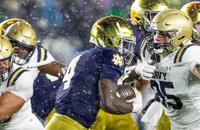 Notre Dame running back Jeremiyah Love runs the ball against Navy.