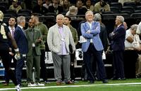 New Orleans Saints general manager Mickey Loomis and senior personnel advisor Randy Mueller talk on the sideline before a game against the Tampa Bay Buccaneers.