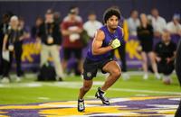 LSU cornerback Mansoor Delane (4) goes through workouts with LSU offensive lineman Josh Thompson (56) during their NFL football pro day, Monday, March 23, 2026, in Baton Rouge, La.