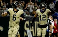 New Orleans Saints quarterback Tyler Shough (6) and wide receiver Chris Olave (12) celebrate a touchdown against the New York Jets.