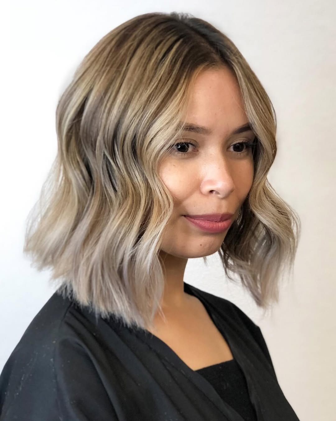 Blunt bob with bright blonde hair