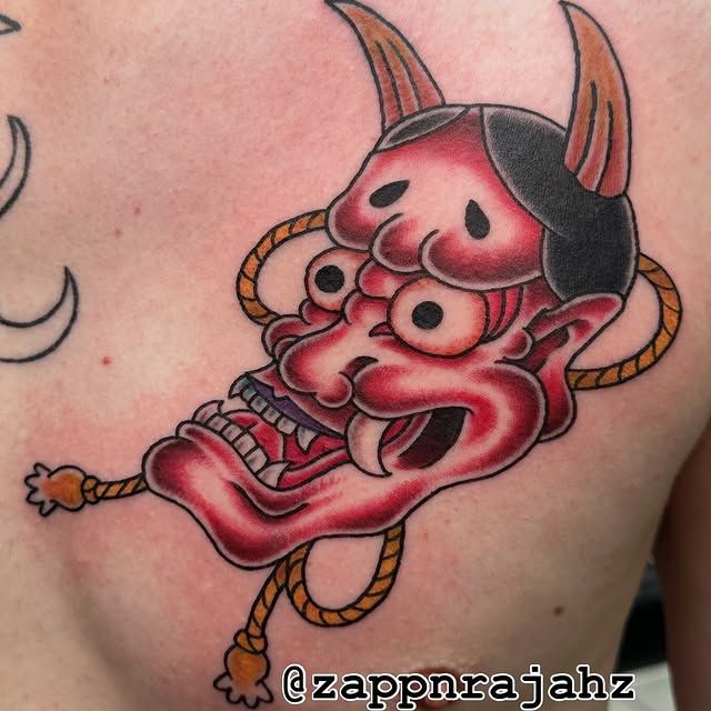 Red Japanese oni mask tattoo by Tomo