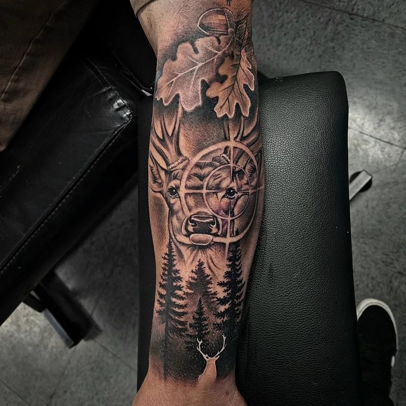 Black and grey demon mask forearm tattoo by Sergio